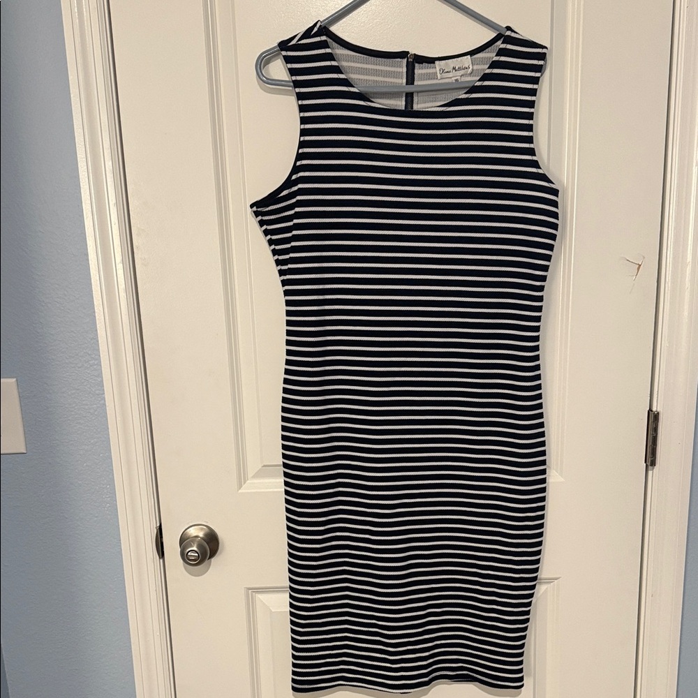 Olivia Matthew’s Navy and White Striped Midi Dress